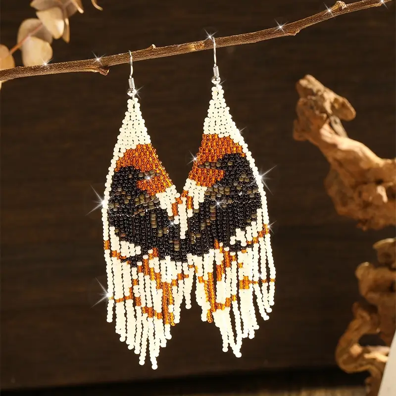 White Tassel Earrings with Playful Movement and Summery Feel