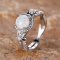 Round Iridescent White Stone Ring with Sparkling Setting