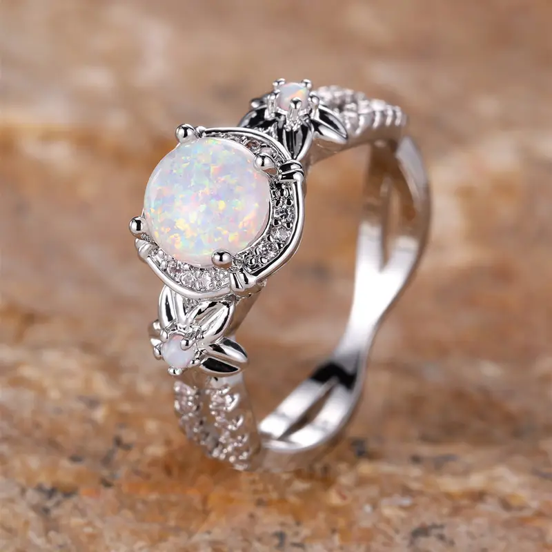 Round Iridescent White Stone Ring with Sparkling Setting