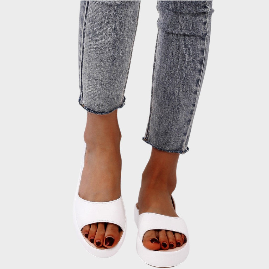Slip in-sandaler med vadderad innersula och lätt sula