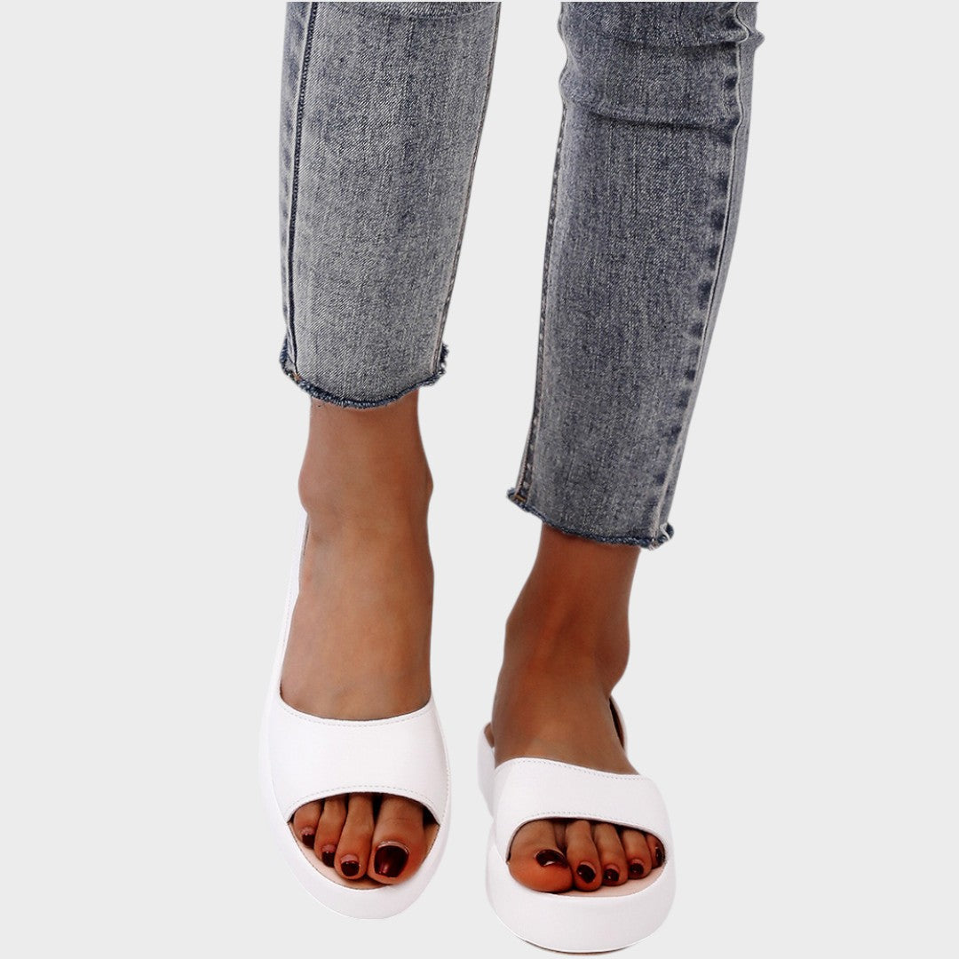 Slip in-sandaler med vadderad innersula och lätt sula