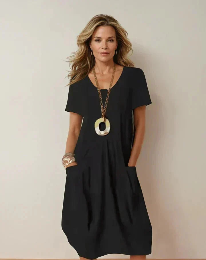 Vestido midi de algodón con escote redondo y bolsillos