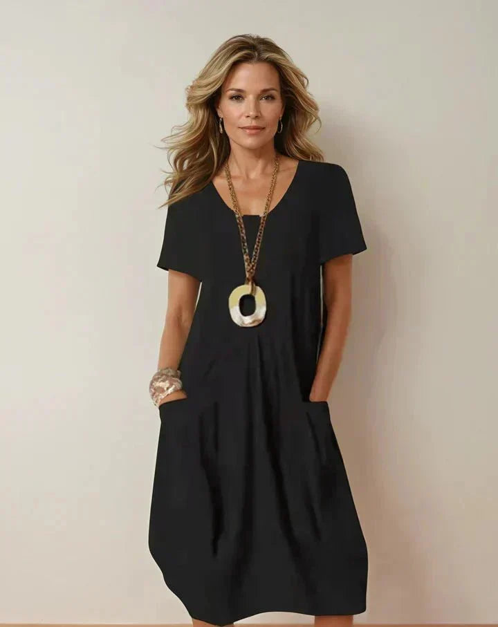 Vestido midi de algodón con escote redondo y bolsillos