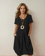 Vestido midi de algodón con escote redondo y bolsillos