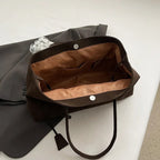 Rymlig totebag med plats för dator