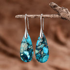 Pendientes artesanales de piedra regalita en forma de gota en azul océano