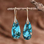 Pendientes artesanales de piedra regalita en forma de gota en azul océano
