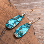 Pendientes artesanales de piedra regalita en forma de gota en azul océano