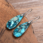 Pendientes artesanales de piedra regalita en forma de gota en azul océano
