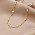 Chain Necklace with Spaced Faux Pearls in Gold Colour