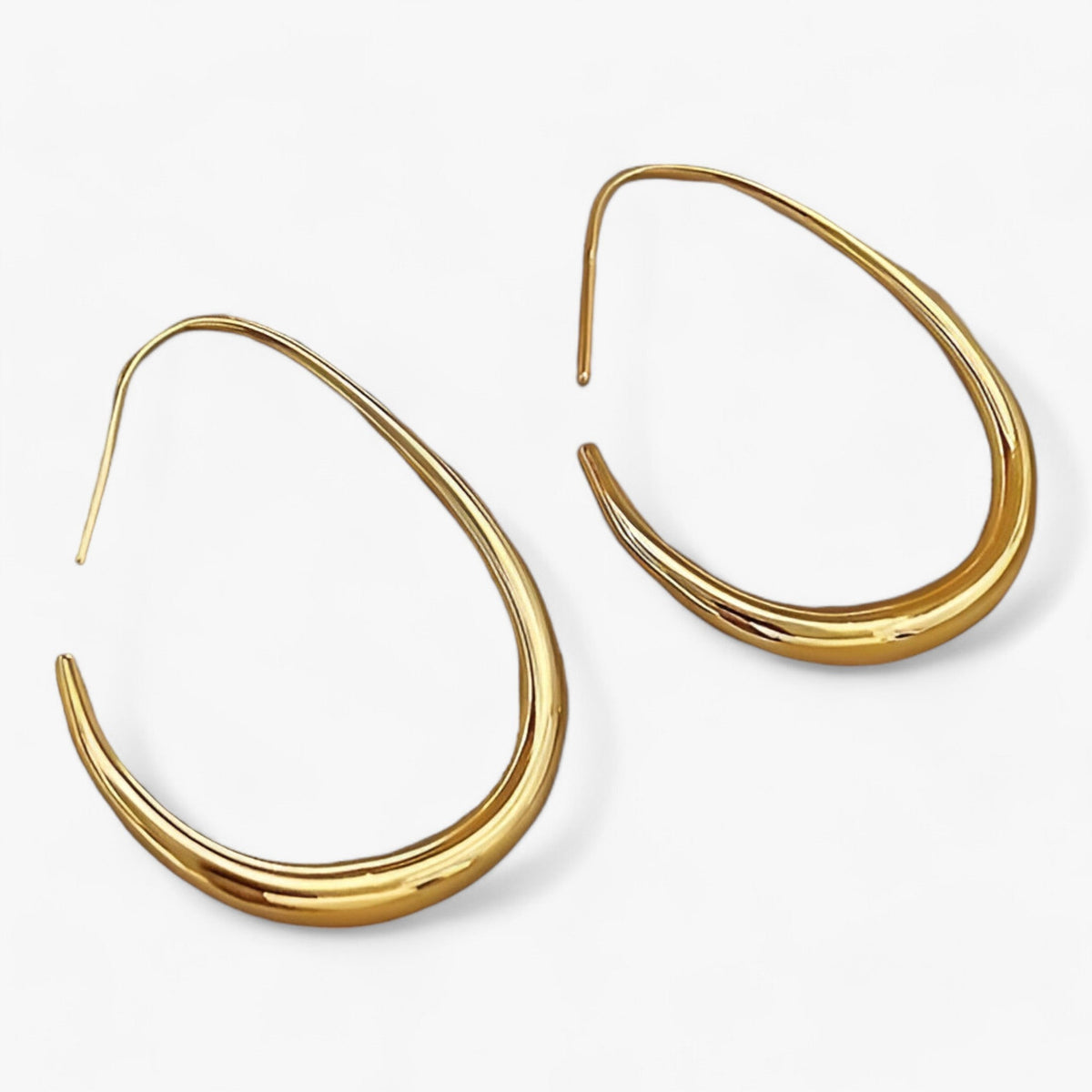 Geometric oval hoop earrings in silver or gold tone