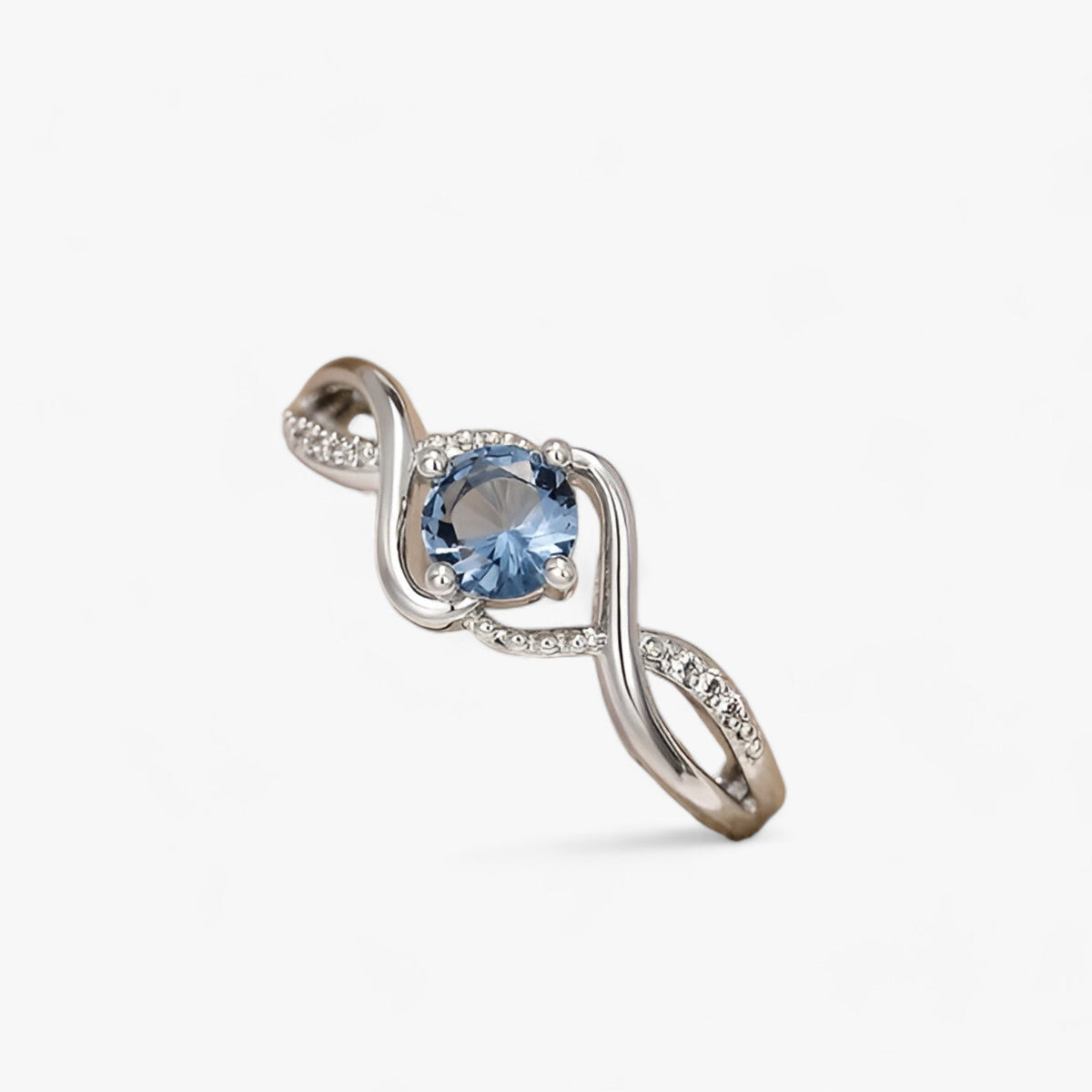 Silver-tone ring with blue cubic zirconia stone