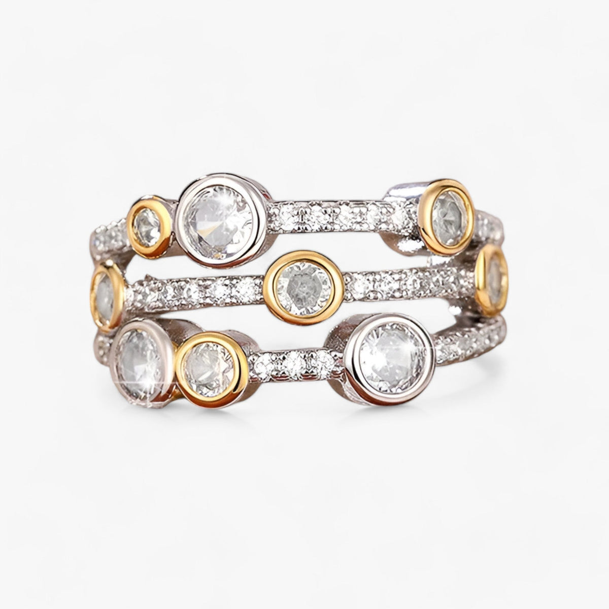 Anillo bicolor vintage con circonita cúbica brillante en el centro
