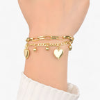Heart Charm Bracelet with a Layered Pearl Chain Design