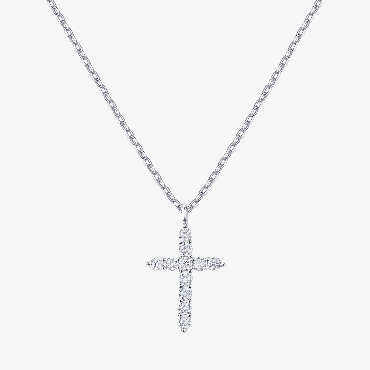 Halsband med korshänge i tre metallfärger att välja mellan