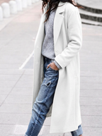 Avslappnad trenchcoat med brett slag och knäppning fram